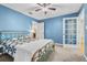 Comfortable bedroom features a ceiling fan, soft carpet, and access to a private bathroom for added convenience at 188 Midlands Pkwy # 507, Summerville, SC 29485
