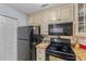 Efficient kitchen featuring updated appliances, ample storage, and stylish countertops at 188 Midlands Pkwy # 507, Summerville, SC 29485