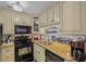 Well-equipped kitchen with granite countertops, modern appliances, and ample cabinet space at 188 Midlands Pkwy # 507, Summerville, SC 29485