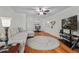 Open-concept living area with hardwood floors, dining space and comfortable seating at 188 Midlands Pkwy # 507, Summerville, SC 29485