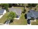 Aerial view showing the home's location, surrounded by green lawns and neighboring houses at 203 Two Hitch Rd, Goose Creek, SC 29445