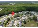 Community aerial view marked with a pin, revealing the home's location in a wooded neighborhood at 203 Two Hitch Rd, Goose Creek, SC 29445