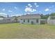 Exterior shot of a home's backyard with a grassy lawn and a wooden fence at 203 Two Hitch Rd, Goose Creek, SC 29445