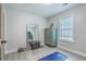 Bright bedroom with modern flooring, fitness weights, and a classic wood dresser at 203 Two Hitch Rd, Goose Creek, SC 29445