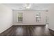 Bright living room featuring modern vinyl floors, ceiling fan, neutral paint, and lots of natural light at 205 Lynton Ct, Goose Creek, SC 29445