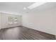 Bright living room featuring modern vinyl floors, neutral paint, and lots of natural light at 205 Lynton Ct, Goose Creek, SC 29445