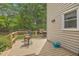 Cozy back deck with a grill and seating perfect for outdoor entertaining and relaxation at 2275 Pristine View Rd, Charleston, SC 29414