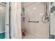 Bathroom shower featuring grab bars, hand-held shower head, and shower bench at 2275 Pristine View Rd, Charleston, SC 29414