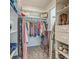 Walk-in closet with custom shelving for clothing and accessories at 2275 Pristine View Rd, Charleston, SC 29414