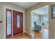 Foyer with decorative front door and hardwood flooring at 2275 Pristine View Rd, Charleston, SC 29414