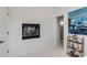 Bright bathroom featuring a fireplace through a window and artistic decorations at 23 Fairway Village Ln, Isle of Palms, SC 29451