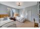 Cozy bedroom with twin beds, ample closet space, and bright natural light at 23 Fairway Village Ln, Isle of Palms, SC 29451