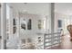 Open foyer showcasing the home's architecture and ample natural light from the windows at 23 Fairway Village Ln, Isle of Palms, SC 29451