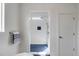 The shower features white subway tile, blue base, and a large shower head at 23 Fairway Village Ln, Isle of Palms, SC 29451