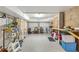 Organized basement featuring ample storage shelves and a workbench, perfect for hobbies and projects at 2408 Bending Oak Loop, Mount Pleasant, SC 29466
