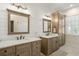 Elegant bathroom with dual vanities, quartz countertops, shiplap walls, and framed mirrors at 2408 Bending Oak Loop, Mount Pleasant, SC 29466