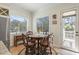 Charming breakfast nook bathed in natural light with a cozy table setting near the kitchen at 2408 Bending Oak Loop, Mount Pleasant, SC 29466