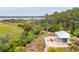 Aerial view showcasing pavilion, fire pit, trails, and waterways within a beautiful community at 2815 Colonel Harrison Dr, Johns Island, SC 29455