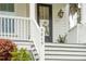 The front porch features a set of stairs, white railings, and a visible house number: 2815 at 2815 Colonel Harrison Dr, Johns Island, SC 29455