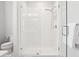 A sleek, glass-enclosed shower with white subway tile, and a modern showerhead at 2815 Colonel Harrison Dr, Johns Island, SC 29455