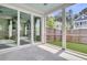 A screened-in back porch with concrete floors leads out to a fenced-in backyard at 2866 Sugarberry Ln, Johns Island, SC 29455