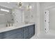 Modern bathroom with double sinks, stylish vanity, and a glass-enclosed shower at 2866 Sugarberry Ln, Johns Island, SC 29455