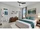 Bright bedroom with an ensuite bathroom, a dresser with shelves, and calming colors at 2866 Sugarberry Ln, Johns Island, SC 29455