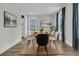 Airy dining room with modern decor, natural light, and comfortable seating at 2866 Sugarberry Ln, Johns Island, SC 29455