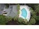 Overhead view of a pool with lots of lounge chairs and a beautiful tree lined area at 308 Pickering Ln, Charleston, SC 29414