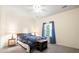 Cozy bedroom with plush carpet, ceiling fan, and natural light from the exterior window at 308 Pickering Ln, Charleston, SC 29414