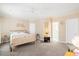 Spacious main bedroom with neutral tones, ceiling fan and carpet flooring at 308 Pickering Ln, Charleston, SC 29414