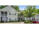 Exterior of a lovely condo building, with well-maintained landscaping and ample parking at 308 Pickering Ln, Charleston, SC 29414