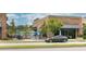 Exterior view of a restaurant with outdoor seating and modern design elements at 308 Pickering Ln, Charleston, SC 29414