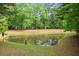 The community pond offers a relaxing natural setting at 308 Pickering Ln, Charleston, SC 29414