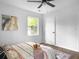 A spacious main bedroom with a ceiling fan and lots of natural light at 3105 Matipan Ave, North Charleston, SC 29405