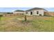 The backyard boasts a privacy fence, patio, and ample space for gardening and outdoor recreation at 313 Squire Pope Rd, Summerville, SC 29486