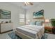 Well-lit bedroom featuring a bed, bedside tables, and artwork, creating a comfortable space at 313 Squire Pope Rd, Summerville, SC 29486