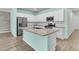 Stylish kitchen with stainless steel appliances, granite countertops, and ample storage at 313 Squire Pope Rd, Summerville, SC 29486