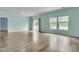Open living area with a sliding glass door and large windows for natural light at 313 Squire Pope Rd, Summerville, SC 29486