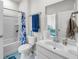 Clean bathroom with a shower-tub combination, single sink vanity, and a towel rack for convenience at 3431 Great Egret Dr, Johns Island, SC 29455
