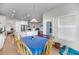 Bright dining area with access to backyard and a view into the living room at 3431 Great Egret Dr, Johns Island, SC 29455