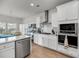 Bright kitchen features stainless steel appliances, ample white cabinetry, and a gas range at 3431 Great Egret Dr, Johns Island, SC 29455