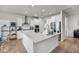 Bright kitchen with stainless steel appliances, white cabinets, and granite countertops at 3431 Great Egret Dr, Johns Island, SC 29455