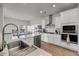 Bright kitchen with stainless steel appliances, white cabinets, and white countertops at 3431 Great Egret Dr, Johns Island, SC 29455