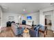 Spacious open living area featuring hardwood floors, neutral paint, and modern furnishings at 3431 Great Egret Dr, Johns Island, SC 29455