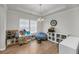 Bright playroom with wood floors, a vaulted ceiling, natural light, and space for learning and imagination at 3431 Great Egret Dr, Johns Island, SC 29455
