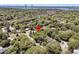 Scenic aerial view of the property showcasing lush greenery, surrounding neighborhood, and proximity to the water, with beautiful bridge view at 356 Hobcaw Dr, Mount Pleasant, SC 29464
