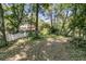 View of the backyard with a white picket fence, and trees at 356 Hobcaw Dr, Mount Pleasant, SC 29464