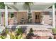 Charming front porch featuring brick steps and columns, seating, and a welcoming entrance at 356 Hobcaw Dr, Mount Pleasant, SC 29464