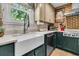 Bright kitchen with a farmhouse sink, stainless steel appliances, and lots of natural light at 356 Hobcaw Dr, Mount Pleasant, SC 29464